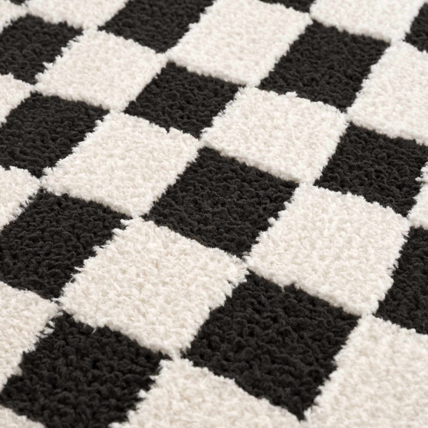Lajos Black &amp; White Checkered Plush Rug