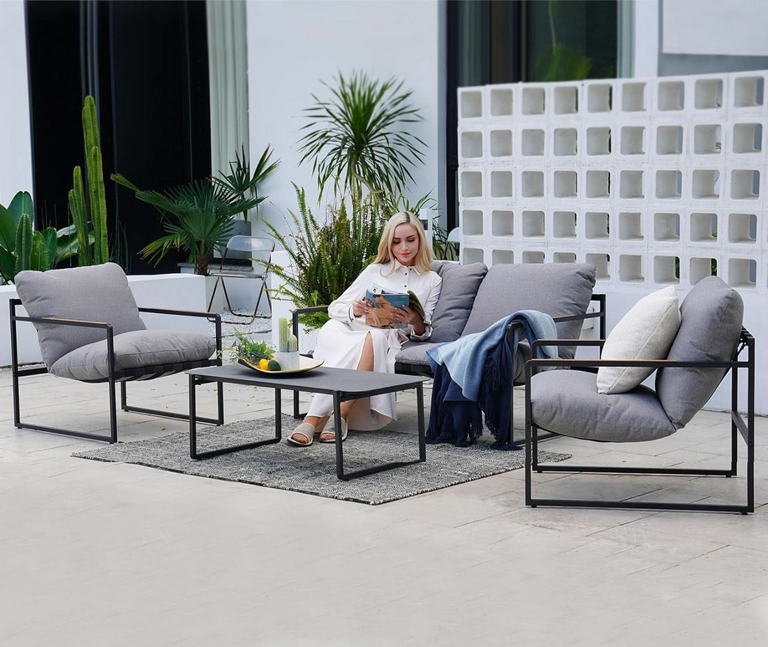 4 Piece Outdoor Slingback Furniture Set With Modern Metal Frames and Gray Cushions
